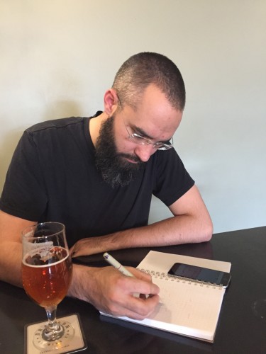 Architect Matthew sketches an idea at a local craft brewery