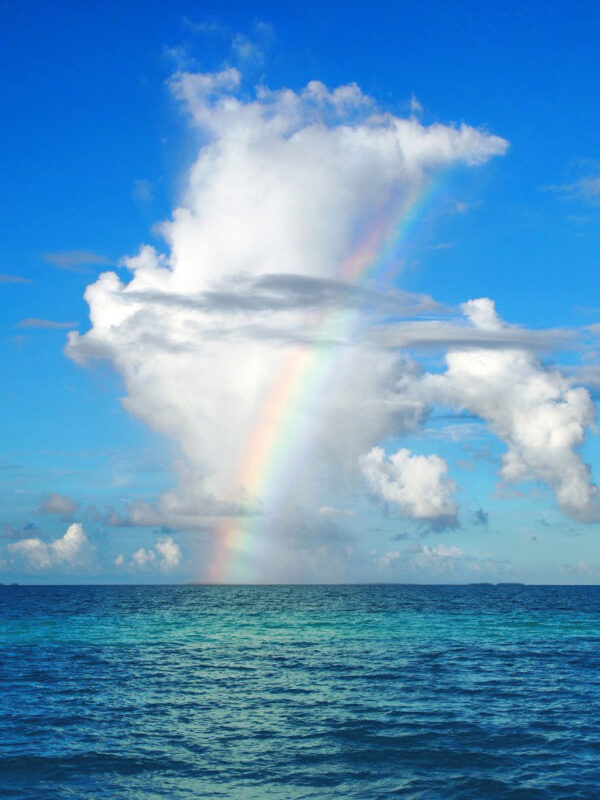 Clouds and rainbow over the Pacific Ocean