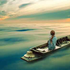 Woman in boat on ethereal sea
