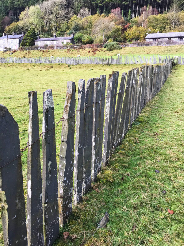 Traditional slate fences are made of scrap slate