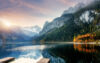 Sunrise over alpine lake in autumn