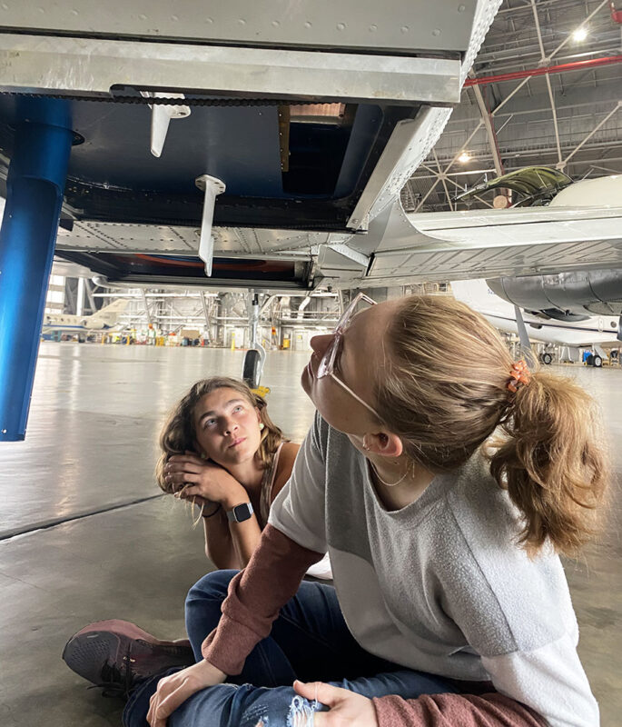 Examining the plane's data collection instrumentation.