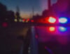 Police car lights at dusk