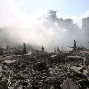 Palestinians look for survivors after bombing in Gaza