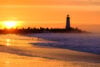 Santa Cruz beach and lighthouse at sunset