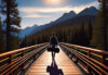 Boy with a guitar case crossing a bridge in the mountains of Montana