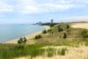 The natural landscape of Indiana Dunes National Park with the NIPSCO Michigan City Generating Station in the background.