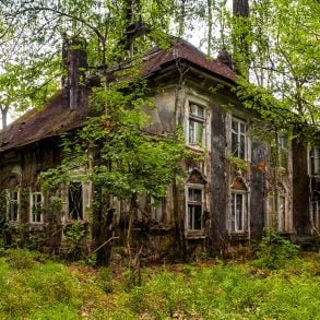 Large abandoned house in the forest